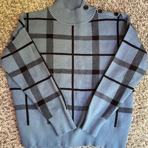 Women’s mock turtleneck sweater with button detail on shoulder